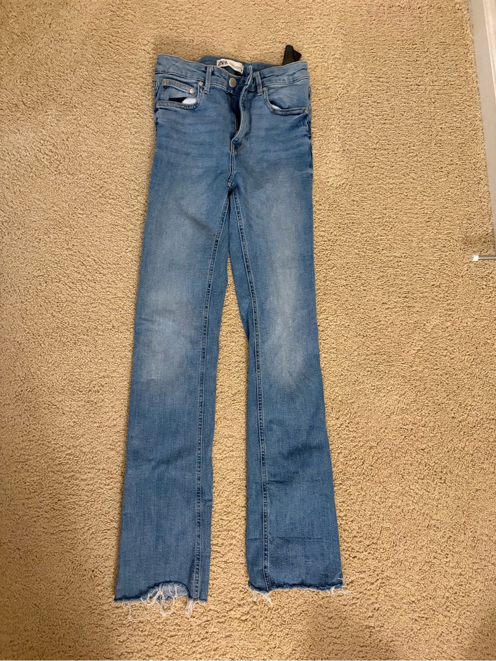 Zara Light Blue Flare Jeans with Raw Hem